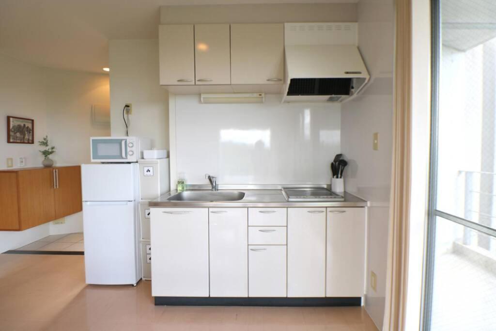 読谷村カービラハウス Ow3 Apartment Bagian luar foto
